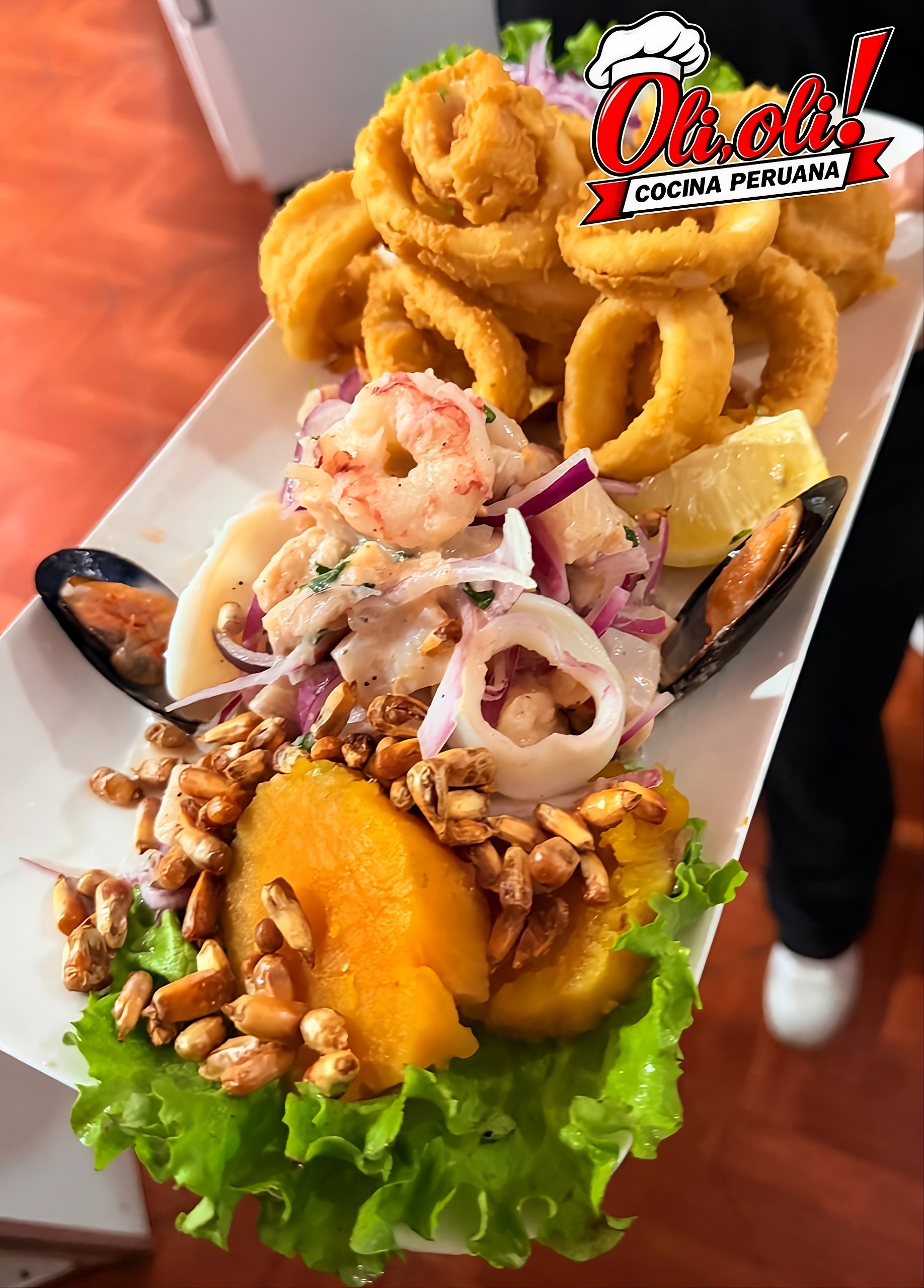 Duo Marino (Ceviche y Rabas) © 2026 Foto de Oli Oli Restaurant, Derechos Reservados.